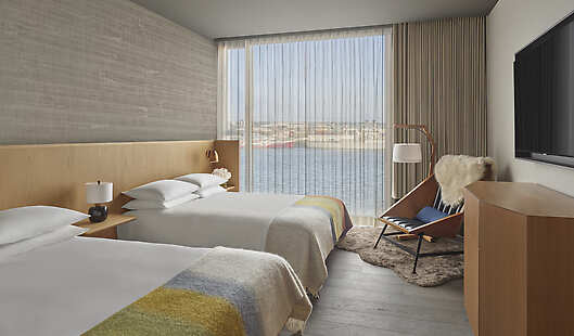 Our sophisticated Deluxe rooms are overlooking the Reykjavik Harbor and are available with King beds and Double beds.
