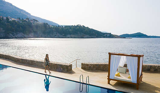 Pool & Beach
Relax on wooden decks above the Adriatic or swim in the freshwater pool, then sip cocktails at Mykorini Beach.