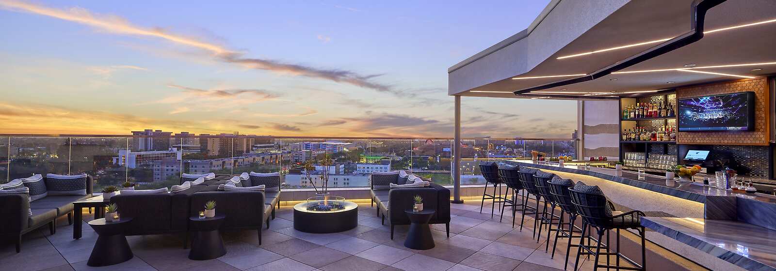 Parkestry Rooftop Bar- A popular hotspot for savoring refreshing cocktails and other delicious menu offerings, the view & Disney® Fireworks 