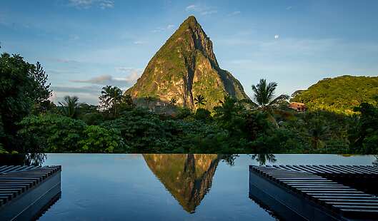 The Petit Piton reflecting in the infinity pool