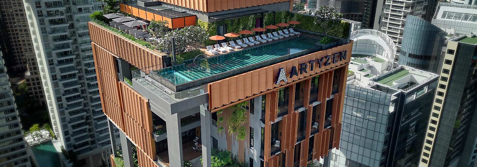 Artyzen Singapore has made way for a striking tower that pays homage to this botanical heritage, with pockets of lush greenery.