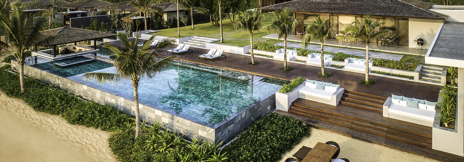 Main swimming pool on the beach infront of the resort. 