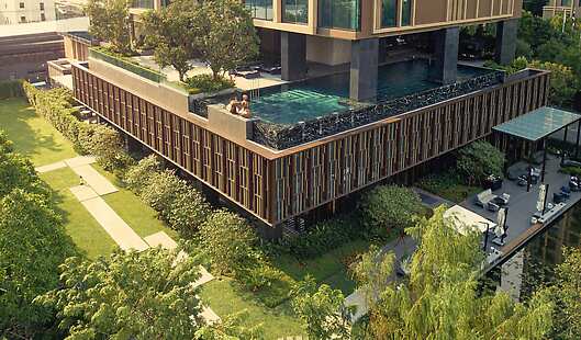 Soak up the sun at the outdoor infinity pool nestled in Kimpton Maa-Lai Bangkok’s secret garden.