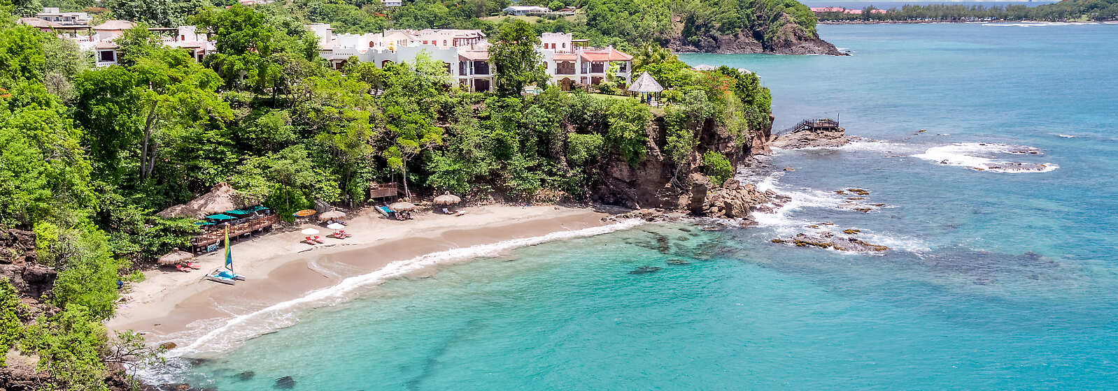 Cap Maison Beach with the Naked Fisherman restaurant