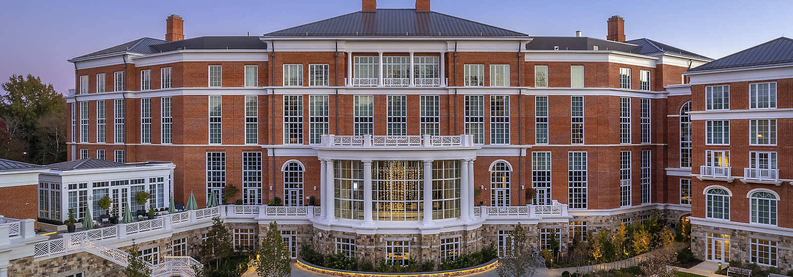 Exterior of Kimpton The Forum Hotel with garden view