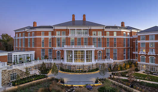 Exterior of Kimpton The Forum Hotel with garden view