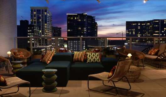 St. Julep roof top bar overlooking the city of Buckhead, Atlanta; music, fun drinks and delicious food!