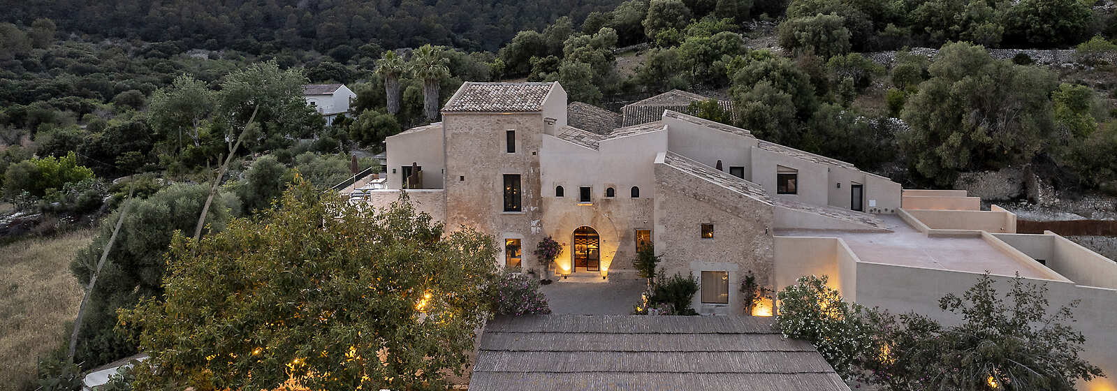 Aerial view of The Lodge with the terrace of the restaurant in front.