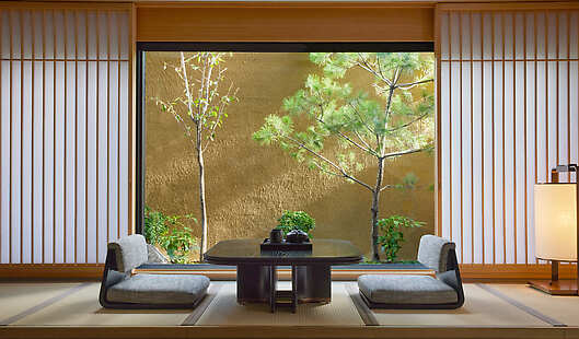 Kyoto-style suite with raised tatami area. Experience authentic ambiance. 