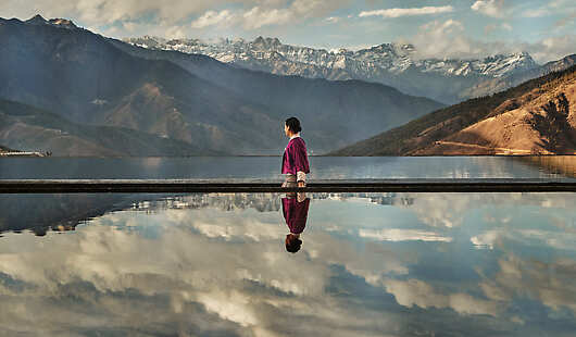 Reflection ponds at Six Senses Thimphu with himalayas in the background