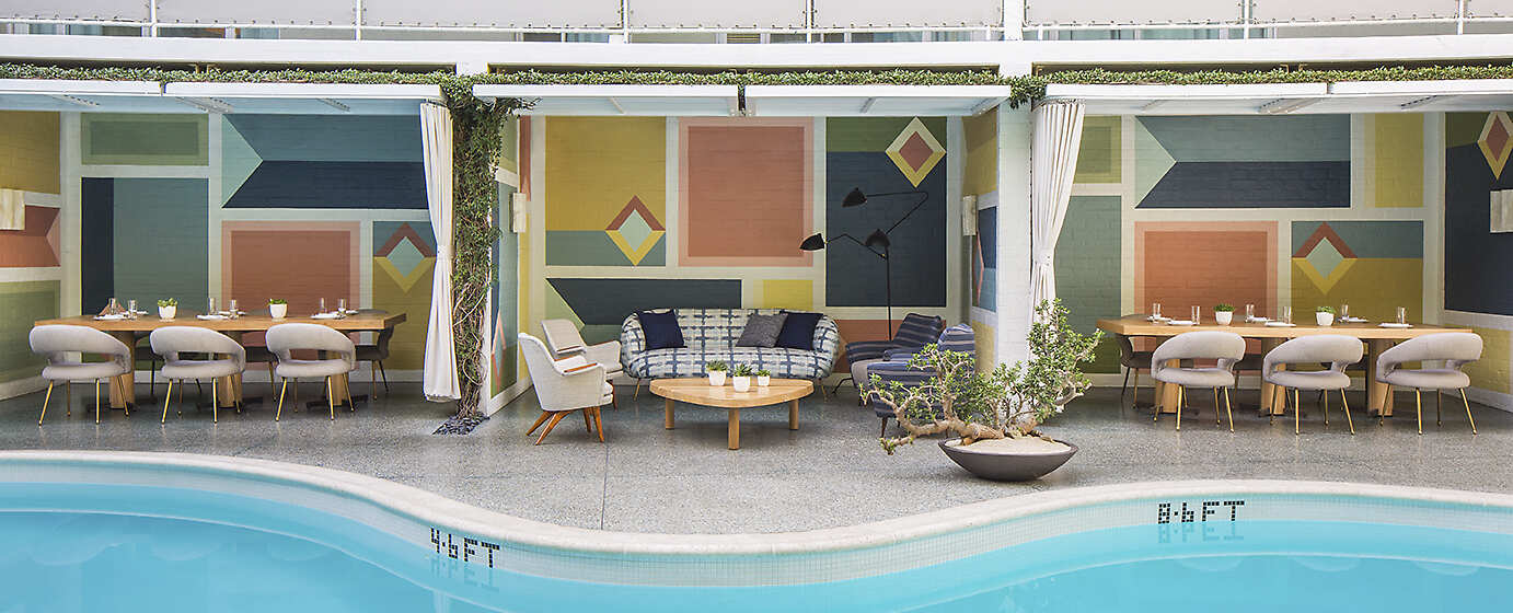 Outdoor heated pool with private cabanas 