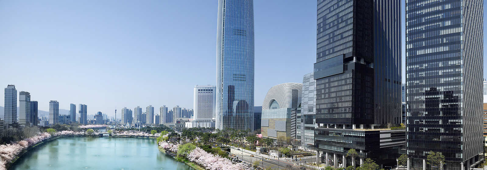 Exterior of hotel with view of spring cherry blossoms