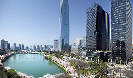 Exterior of hotel with view of spring cherry blossoms