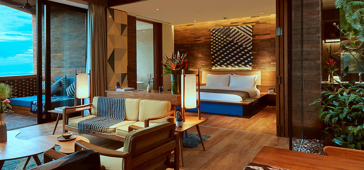 Rooftop Suite Living Area and Guestroom 