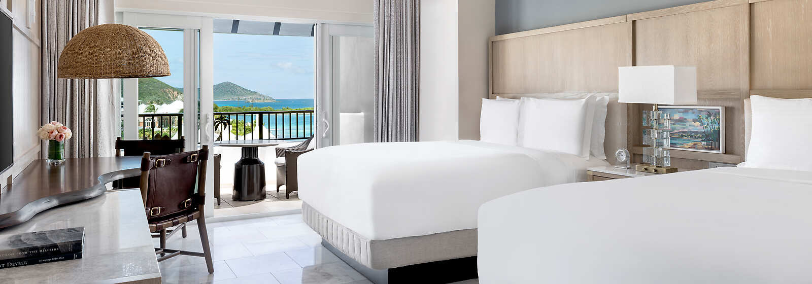 Our renewed Ocean View Rooms feature sweeping ocean views, comfortable two queen beds and a personal balcony