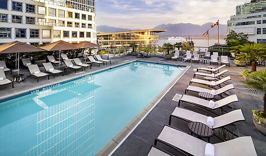 The rooftop pool at Fairmont Waterfront is heated year-round and features harbour views. 