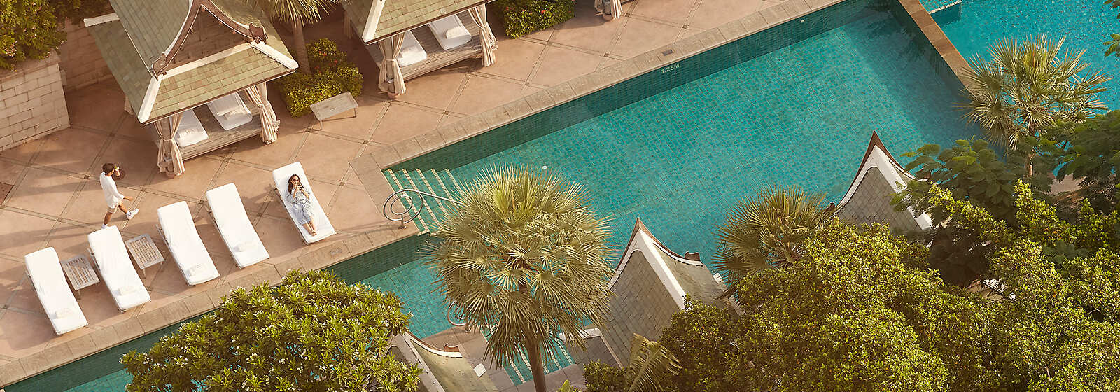 Find you happy place at the poolside of this tranquil resort, where relaxation and bliss unite.