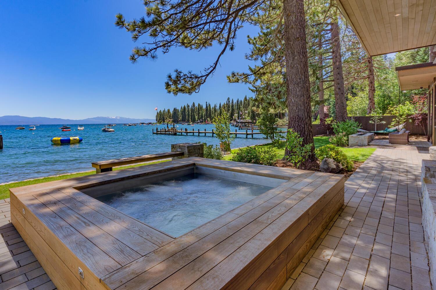 Lakefront outdoor hot tub.