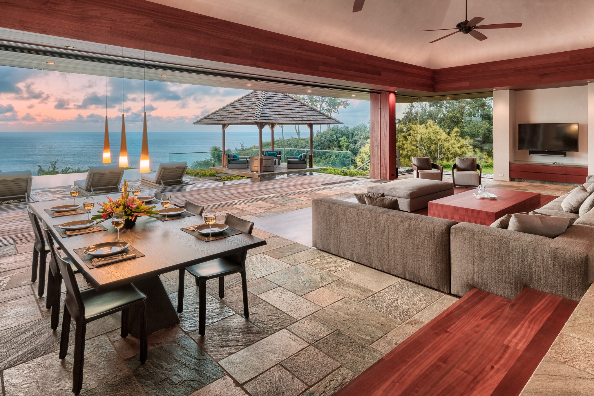 Outdoor lanai and pergola seating outdoor with view of ocean