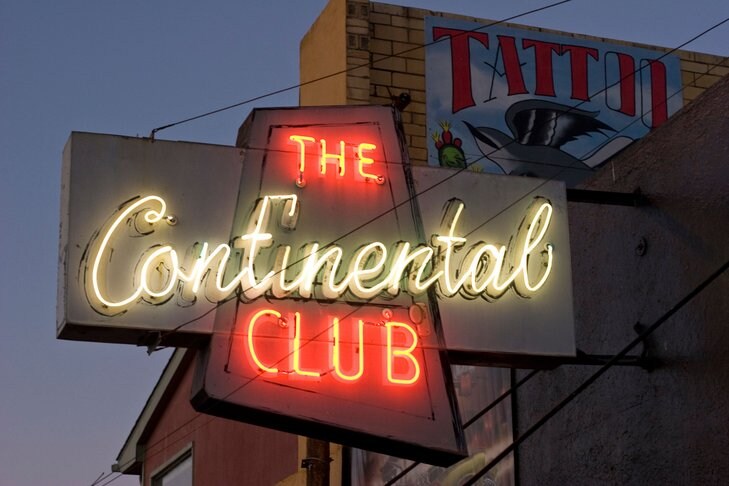 The continental club’s historic sign spells out its name in bright neon.
