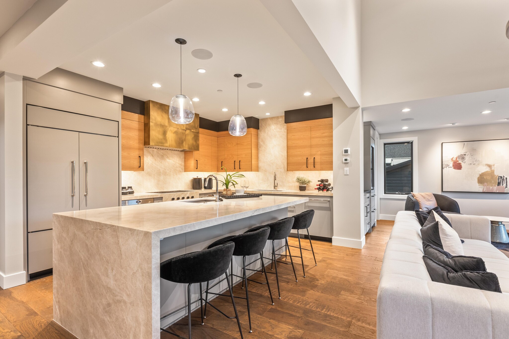 Interior of modern kitchen and living area.