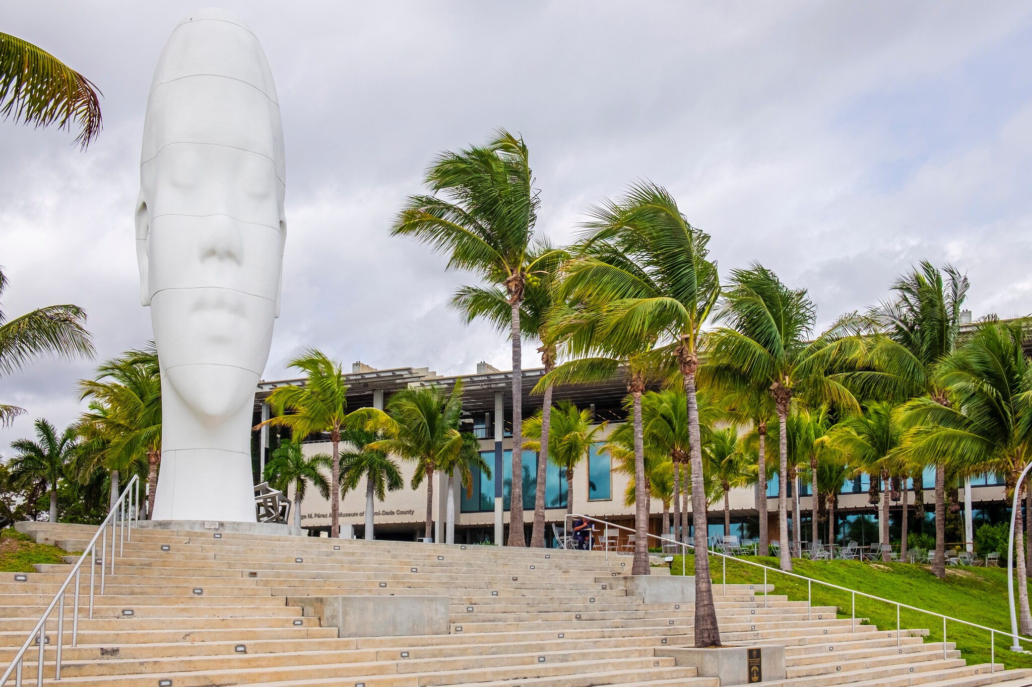 Outside the Perez Art Museum Miami stands Looking into my Dreams Awilda, a 39-foot sculpture of a stretched human head by Jaume Plensa.