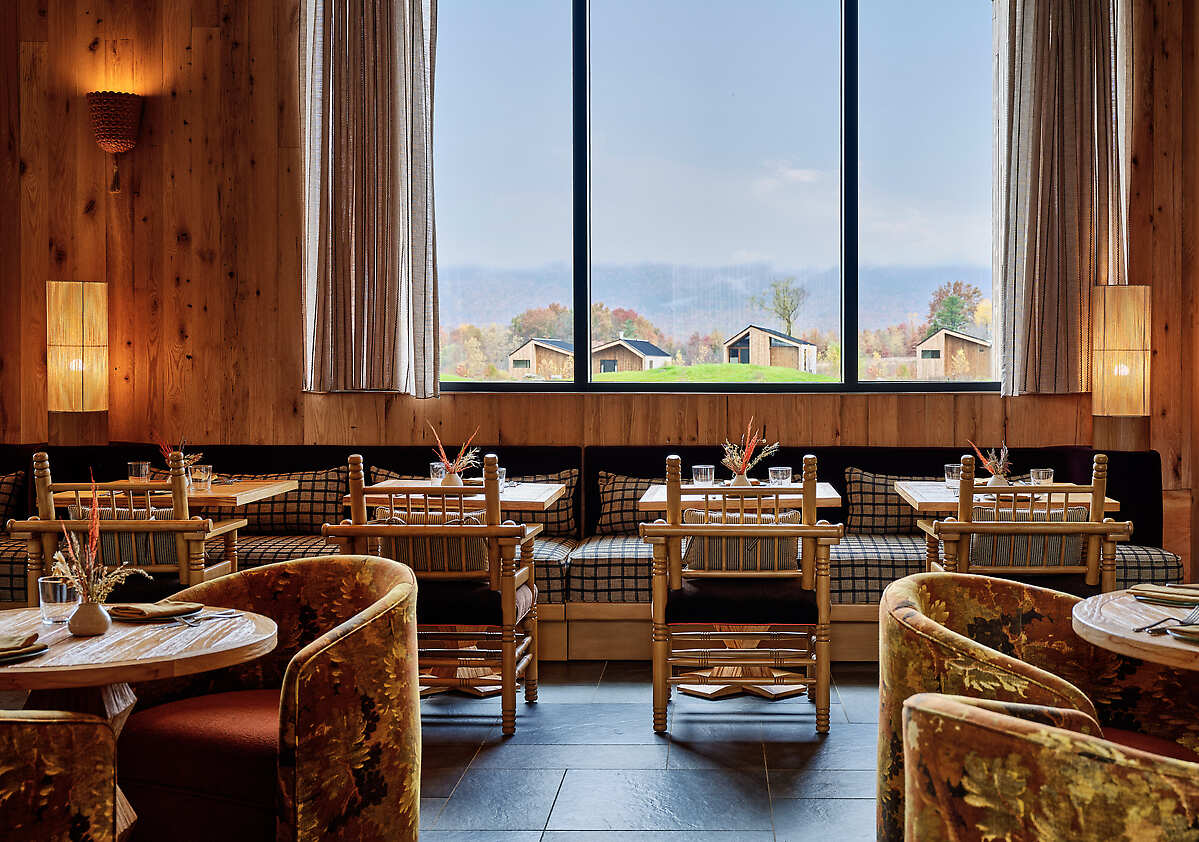 Dining room window with cabins in distance