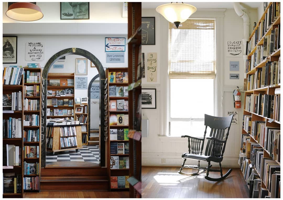 In City Lights, a rocking chair sits in front of tall shelves of books, and an arched doorway opens from one room of bookshelves to another.